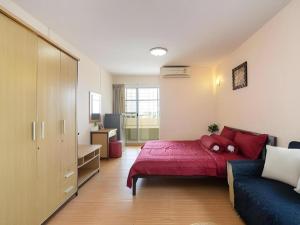 Postel nebo postele na pokoji v ubytování SURANG MANSION + 69 fotografií