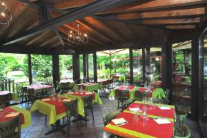 Restoran atau tempat makan lain di Trattoria Laghee con alloggio