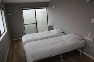 Postel nebo postele na pokoji v ubytování Dragon Bay Villa - Vacation STAY 12533v