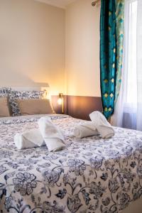 Ένα ή περισσότερα κρεβάτια σε δωμάτιο στο Appartement tout confort