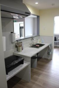 Kuchyň nebo kuchyňský kout v ubytování Dragon Bay Villa - Vacation STAY 12533v