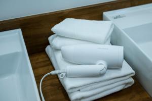 a box with white towels and a wii controller at Seaside Villa N - Vacation STAY 21981v in Mitsugoe +50 photos