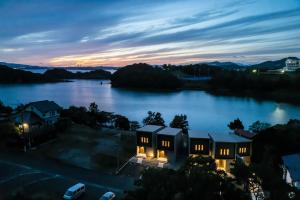 a view of a large lake at night at Seaside Villa N - Vacation STAY 21981v in Mitsugoe
