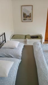 Postel nebo postele na pokoji v ubytování Chalupa ve Svinné