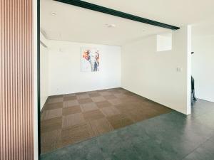 an empty room with a painting of an elephant on the wall at CORAL RESORT VILLA atsuhama - Vacation STAY 21316v in Sumoto