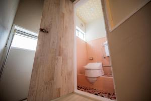 a bathroom with a toilet and a shower at Hyuga Surf Camp106 - Vacation STAY 29716v in Hyuga +18 photos
