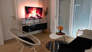 Μια τηλεόραση ή/και κέντρο ψυχαγωγίας στο West Wing - Apartmani Živinice
