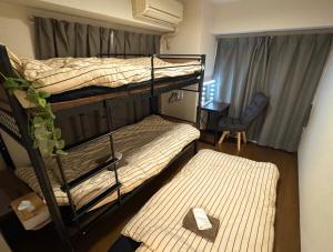 Postel nebo postele na pokoji v ubytování Courtheim Yokohama 212 - Vacation STAY 18638