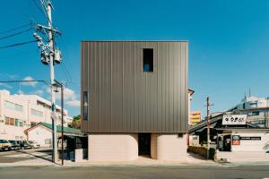 a building on the side of a street at Nagominonedoko - Vacation STAY 48069v in Nishinoomote