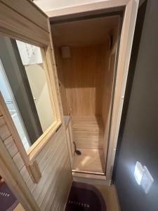 a stairwell in a tiny house with a window at Minpaku Dorihu - Vacation STAY 18675 in Taiki