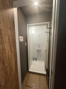 a bathroom with a shower and a walk in shower at Minpaku Dorihu - Vacation STAY 18674 in Taiki