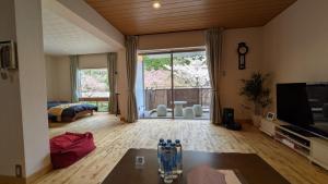 Ένα ή περισσότερα κρεβάτια σε δωμάτιο στο Condominium Sakura B5 - Vacation STAY 56334v