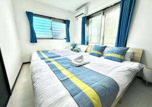 Postel nebo postele na pokoji v ubytování Miyakojima - House - Vacation STAY 18725