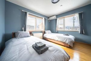 Ένα ή περισσότερα κρεβάτια σε δωμάτιο στο TORENIA - Vacation STAY 73704v