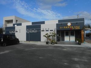 a building with a car parked in front of it at Youth Hostel KiKai - Vacation STAY 86049v in Akaren