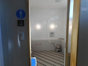 a small bathroom with a toilet in a room at Youth Hostel KiKai - Vacation STAY 92589v in Akaren