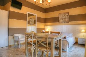 Posezení v ubytování La Casetta di Lina Rooms and Apartments