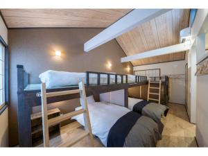 En eller flere senge i et værelse på YADOYA Matsugaya - Vacation STAY 91980v