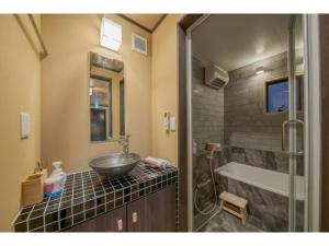 Et badeværelse på YADOYA Matsugaya - Vacation STAY 91980v + 26 billeder