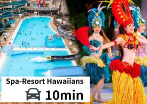 two women are standing in front of a swimming pool at Refugio del Café - Vacation STAY 92035v in Iwaki
