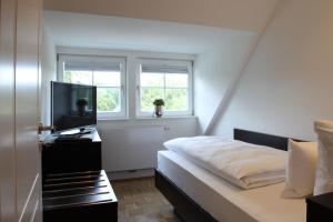 Postel nebo postele na pokoji v ubytování Residenz Itterbach