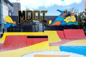 a skate park with a ramp with the mott sign at Moqi Hotel Wuhan in Wuhan