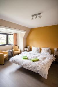 Postel nebo postele na pokoji v ubytování B&B 't Solveldje