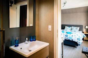 Postel nebo postele na pokoji v ubytování B&B 't Solveldje