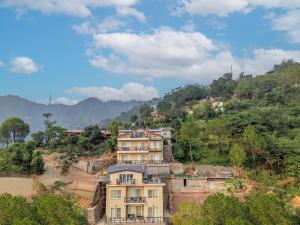 a house on top of a hill at Konifer Greyvine in Kasauli +92 photos