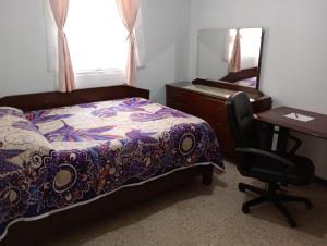 Una cama o camas en una habitación de Departamento entero en Lomas de Sotelo cerca de Polanco