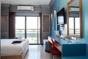 En eller flere senge i et værelse på Phitsanulok Orchid Hotel + 187 billeder