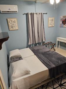 Ένα ή περισσότερα κρεβάτια σε δωμάτιο στο ALMOND Cove