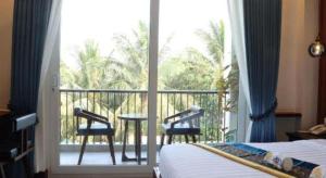 Ένα ή περισσότερα κρεβάτια σε δωμάτιο στο Sky Boutique Kampot +85 φωτογραφίες