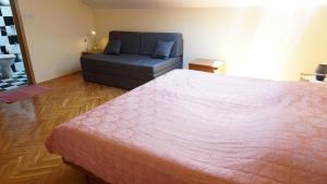 Postel nebo postele na pokoji v ubytování Guesthouse Garni