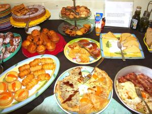a table full of different types of food on plates at Locanda Degli Agrumi in Conca dei Marini