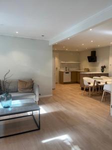 Χώρος καθιστικού στο Tromsø City Apartment