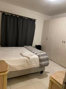 Cama ou camas em um quarto em Leo46