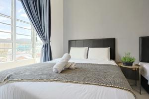 Katil atau katil-katil dalam bilik di Chill & Bloom -Cameron Highlands Escape Clover Home M02