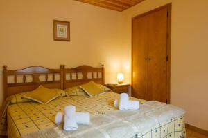 Posteľ alebo postele v izbe v ubytovaní Hostal Aiguamog