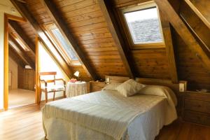 Posteľ alebo postele v izbe v ubytovaní Hostal Aiguamog