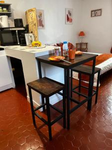 Kuchyň nebo kuchyňský kout v ubytování Au coeur du village provençal