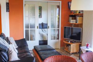 TV a/nebo společenská místnost v ubytování Casa Laluni