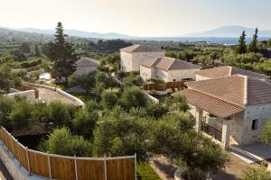 an aerial view of a house with a fence at Conte Maris IV in Tragaki