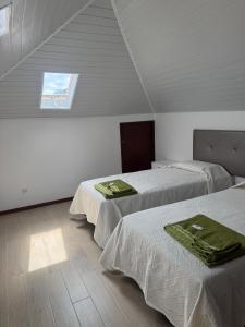 Postel nebo postele na pokoji v ubytování Casa da Rochinha