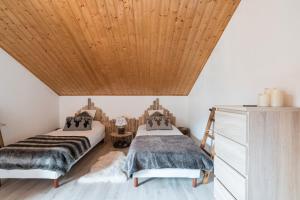 Postel nebo postele na pokoji v ubytování Chalet Familial avec Jacuzzi