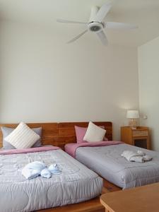 En eller flere senge i et værelse på Luxury Design 3 Bedroom Villa AB2