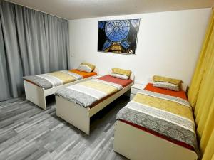 Postel nebo postele na pokoji v ubytování City View Apartment in Duisburg