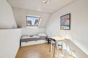 Ένα ή περισσότερα κρεβάτια σε δωμάτιο στο Apartment B - 5 Personen