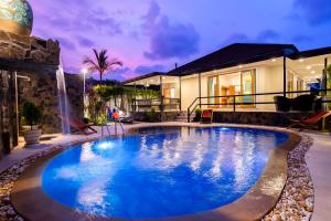 a swimming pool in the backyard of a house at Arabella Ao Nang Private Pool Villa in Ao Nang Beach