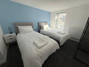 Ένα ή περισσότερα κρεβάτια σε δωμάτιο στο New 3 Bedroom Flat Close to Station +4 φωτογραφίες